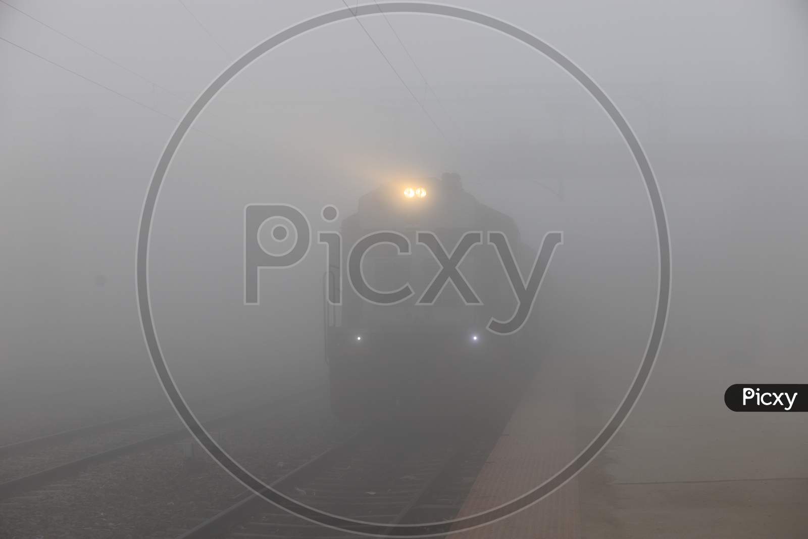 Indian Railways train running On Track in an Winter Morning