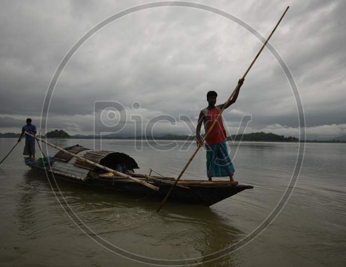 Fisherman in Boats Fishing on Bramhaputra River