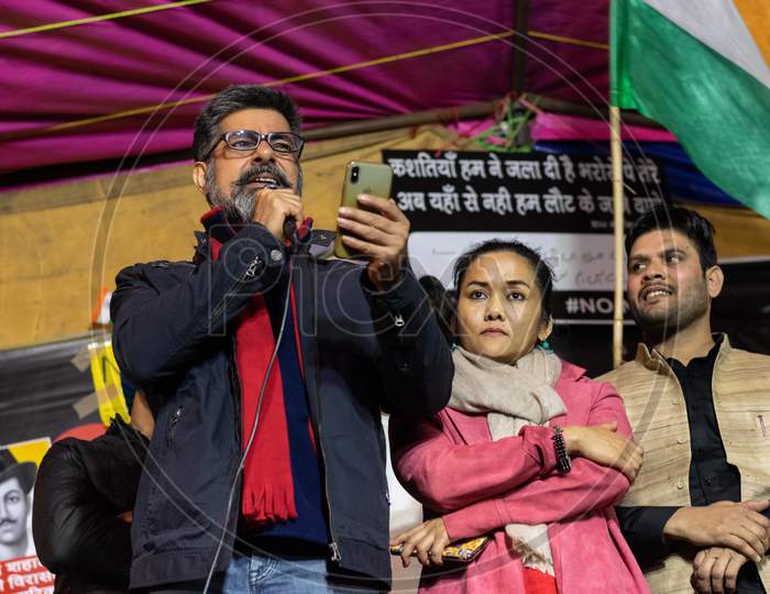 Actor Sushant Singh and his wife Molina Singh speaking on stage at shaheen Bagh during protest against Citizenship Amendment Act CAA, National Register Of Citizens NRC and National Population Register NPR