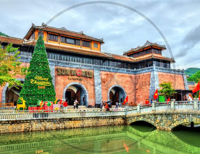 The Main Entrance To Ba Na Hills Resort With A Christmas Tree