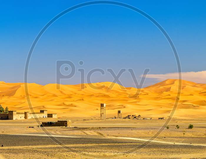 Sand Dunes In The Sahara Desert At Merzouga, Morocco