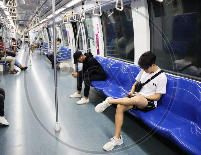 passengers in Singapore metro.