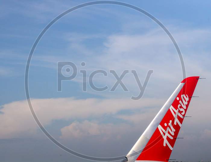 A View Of Air Asia Flight Wing From Fight Window