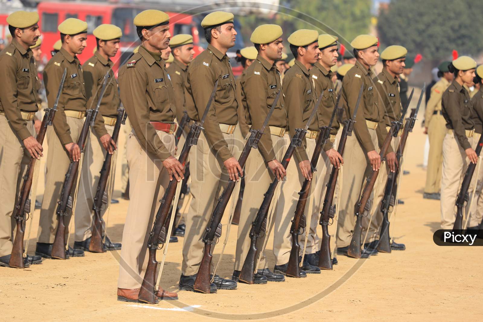 Indian Police Man  Standing In Lines With Guns At a Parade