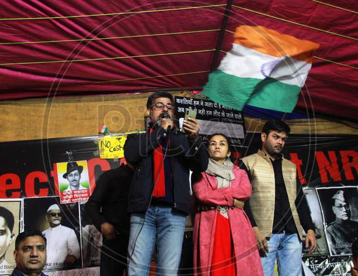 Actor Sushant Singh speaks as he addresses the people who take part a sit-in protest against NRC, CAA AND NPR, at Shaheen Bagh in New Delhi