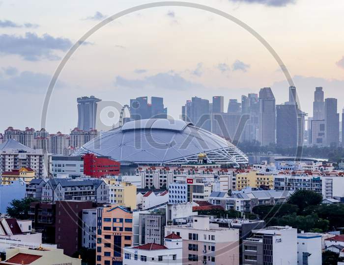 Singapore Stadium and downtown skyline as seen from geylang.