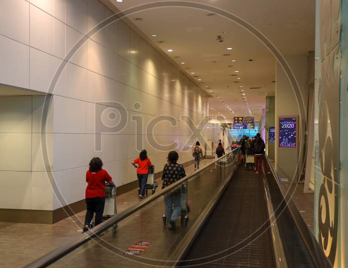 Passengers  Travel Scenes With Bags and Trolleys in KL International Airport, Malaysia