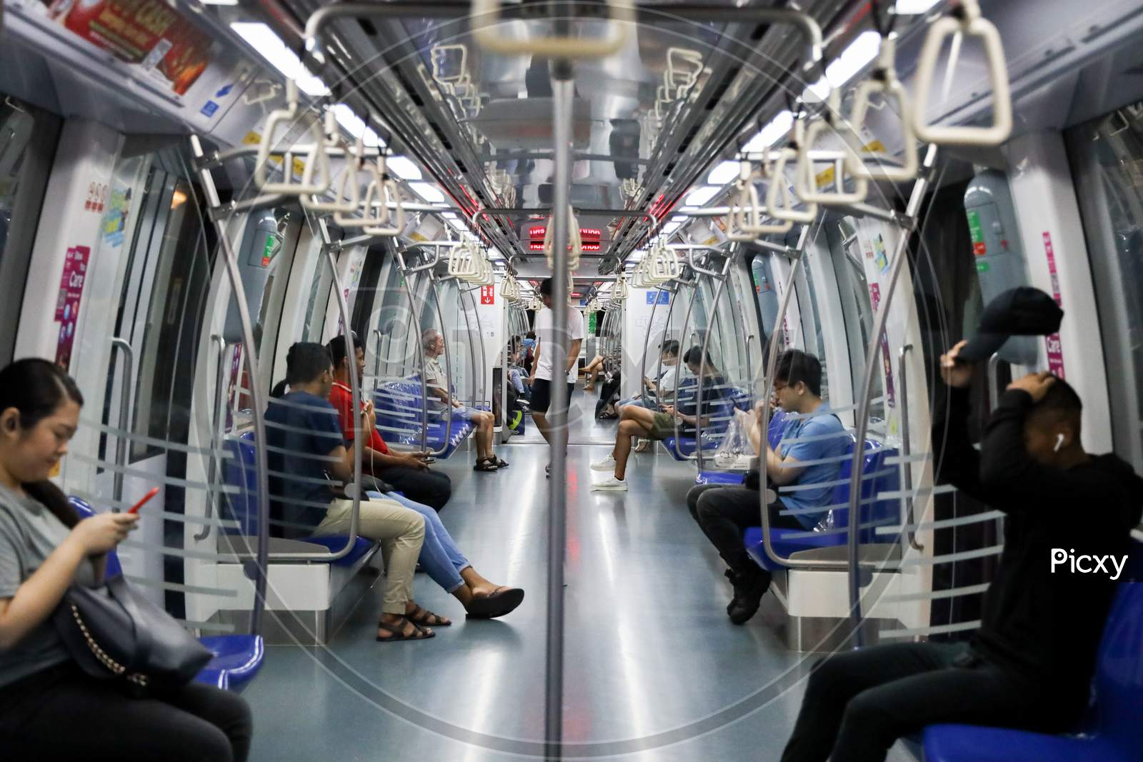 Singapore Metro train with passengers.