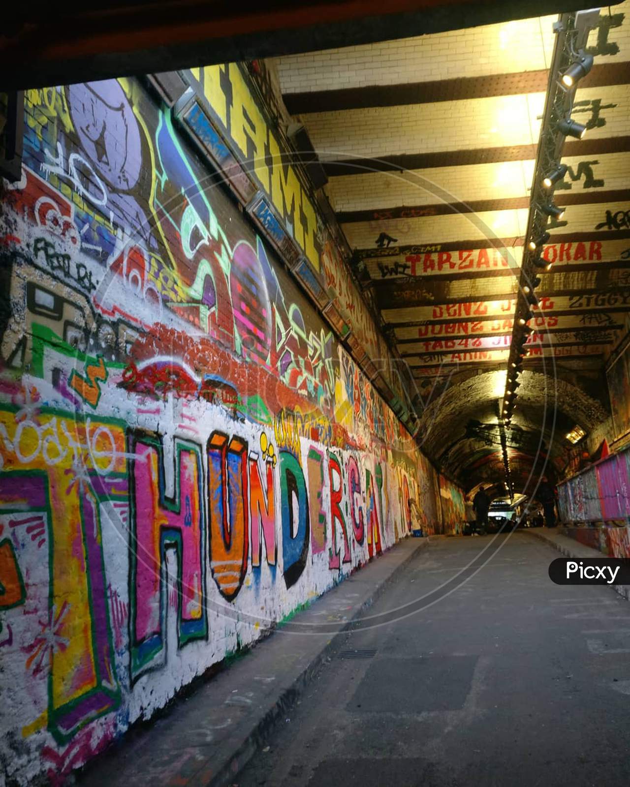 A Subway With Graffiti Painting
