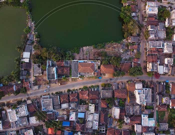Aerial Shot of village with a pond in east godavari