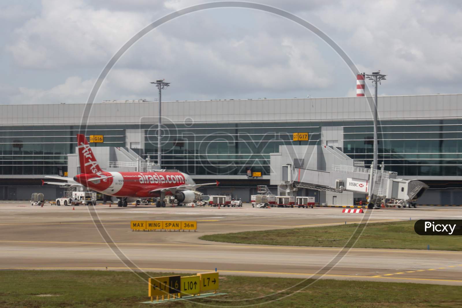 Air Asia Flights At Terminal in  Changi Airport, Singapore