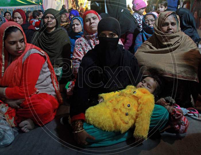 People Take Part In A Sit In Protest Against NRC, CAA And NPR At Khureji Khas In New Delhi