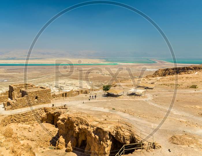 Ruins Of Masada Fortress And Dead Sea