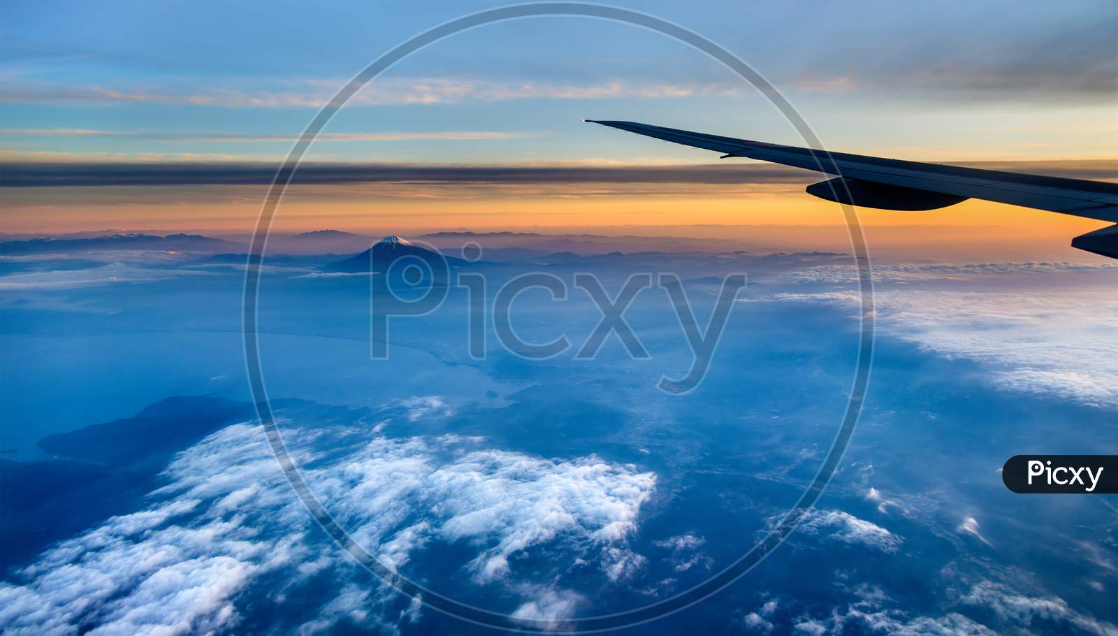 View Of Mount Fuji Through Airplane Window