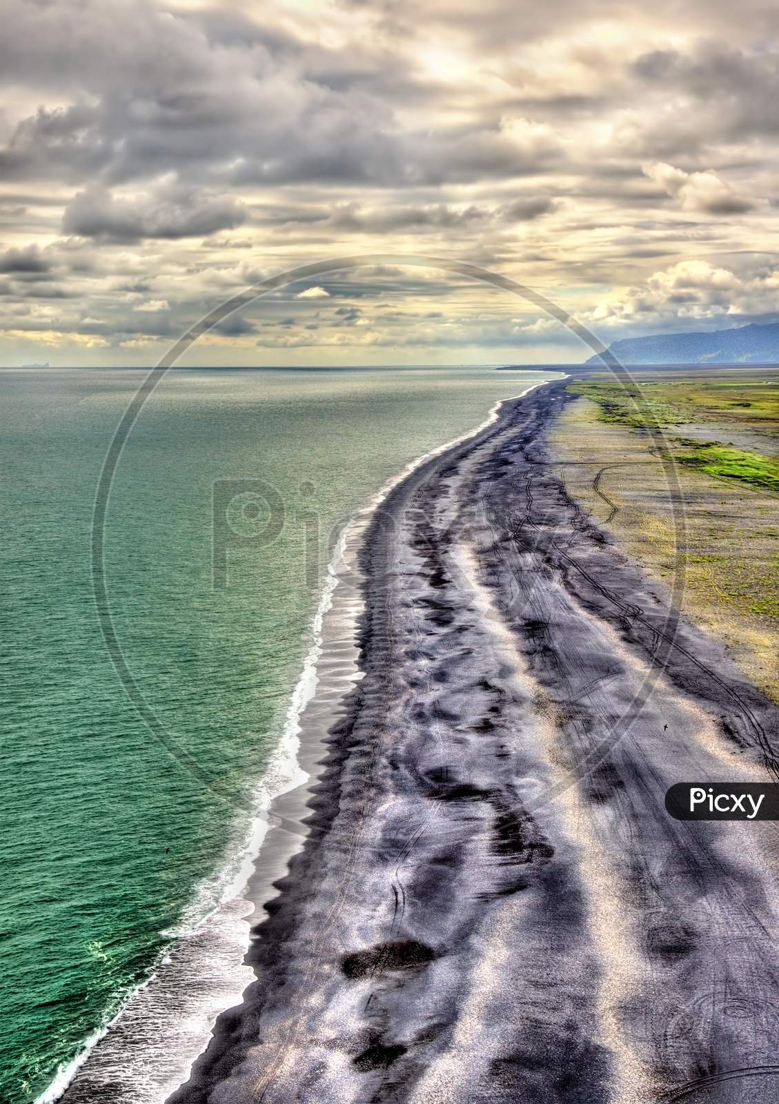 The Black Sand Beach Of Vik In Iceland