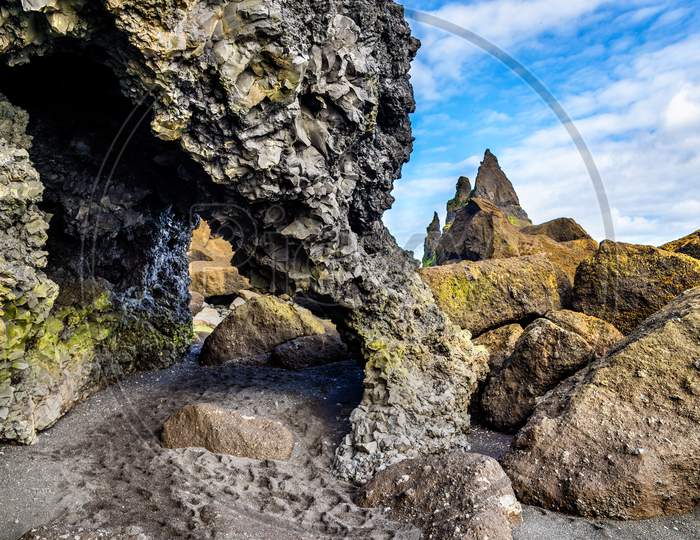 Natural Basalt Arch At Reynishofn Beach - Iceland