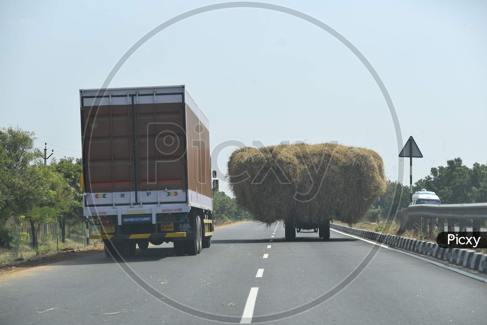 Hay carrying Tractor and Container Lorries on NH 44