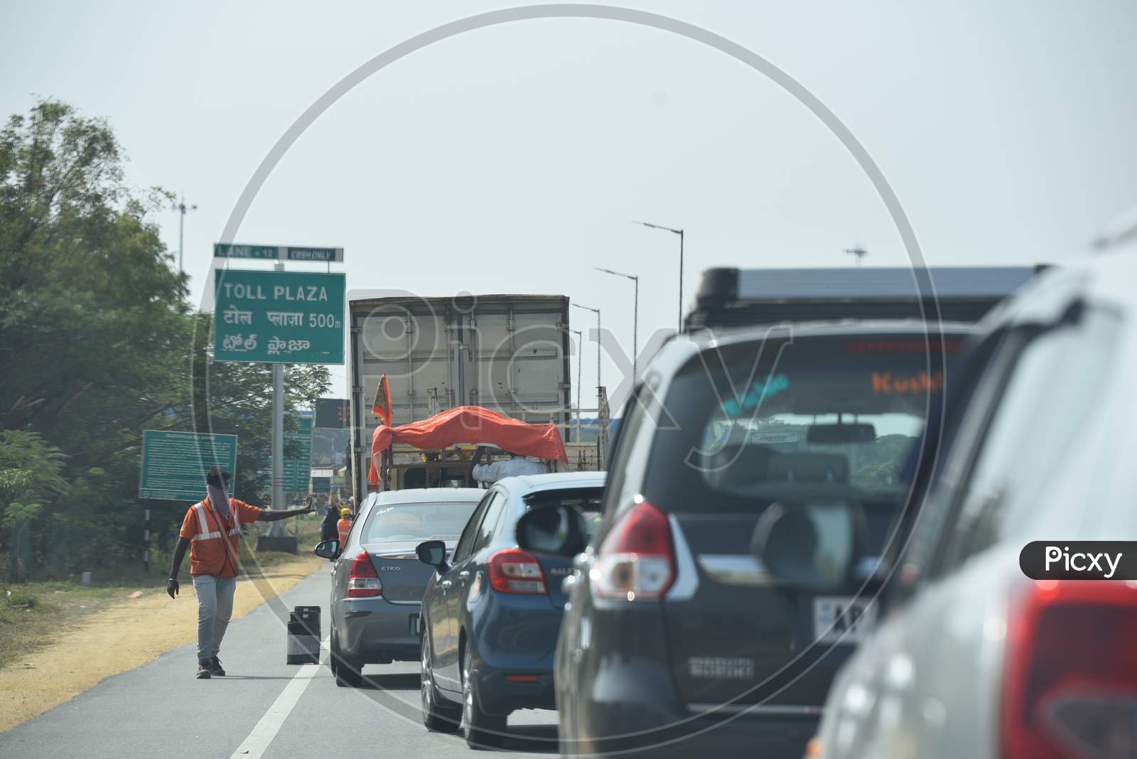 Cash Only lane at a Toll Plaza with huge traffic jam
