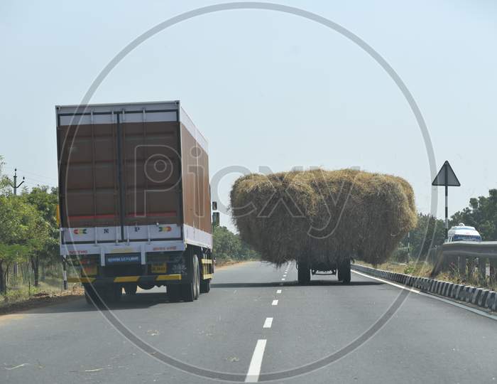 Hay carrying Tractor and Container Lorries on NH 44