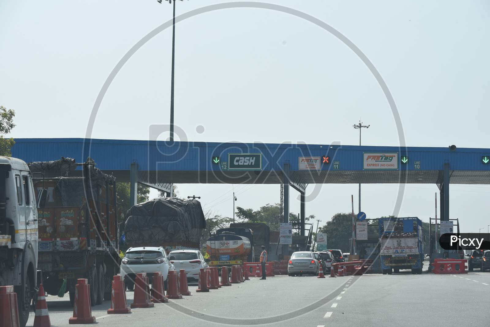 Cash Only and FastTag Lanes at a Toll Plaza