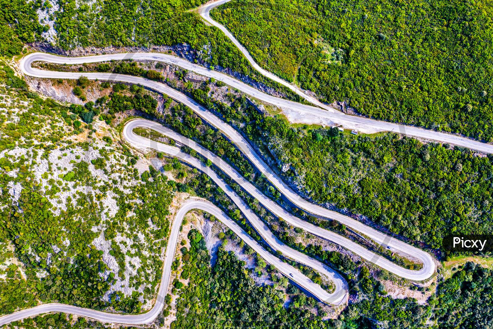 Winding Road In The Mountains Of Greece