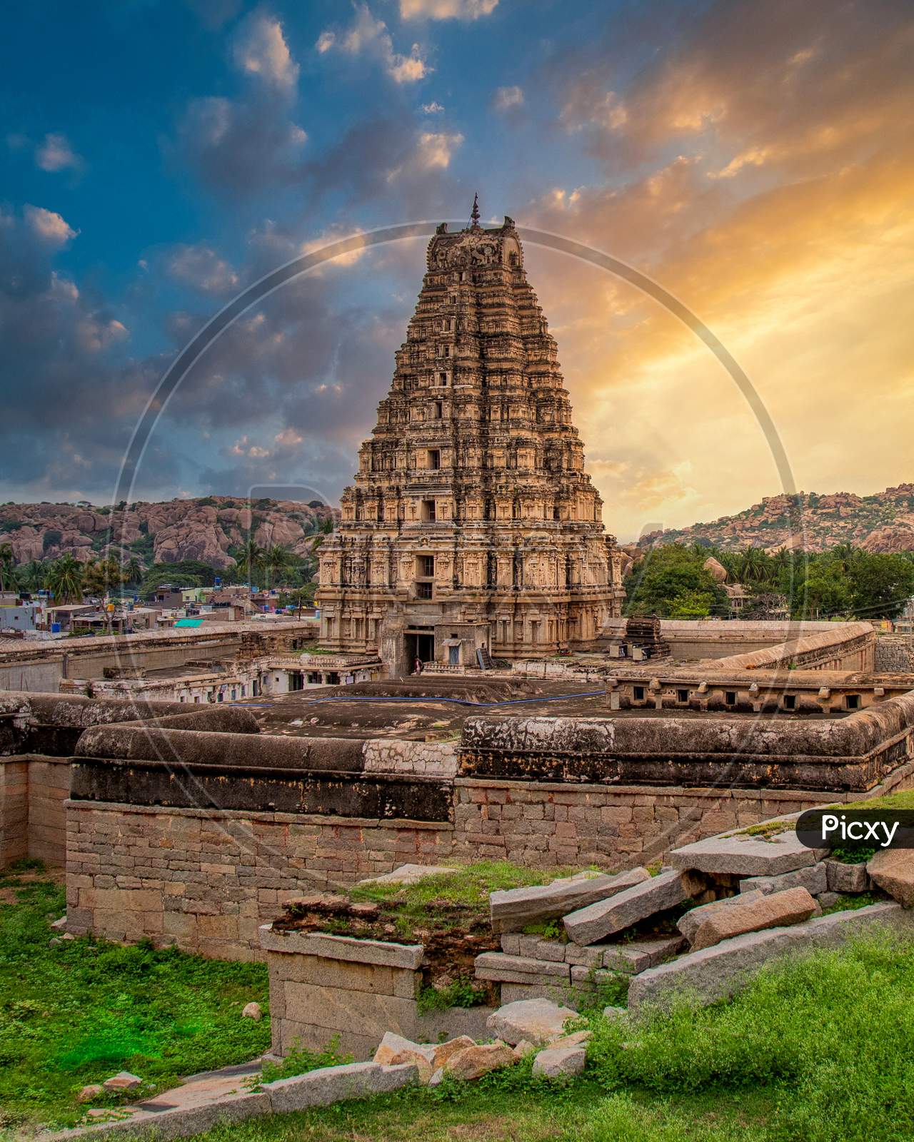 Virupaksha Temple in Hampi With Temple Shrine And  Golden  Sunset Clouds in Background