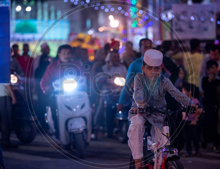 A Boy Riding Bicycle  On Yakutpura   Streets in Hyderabad