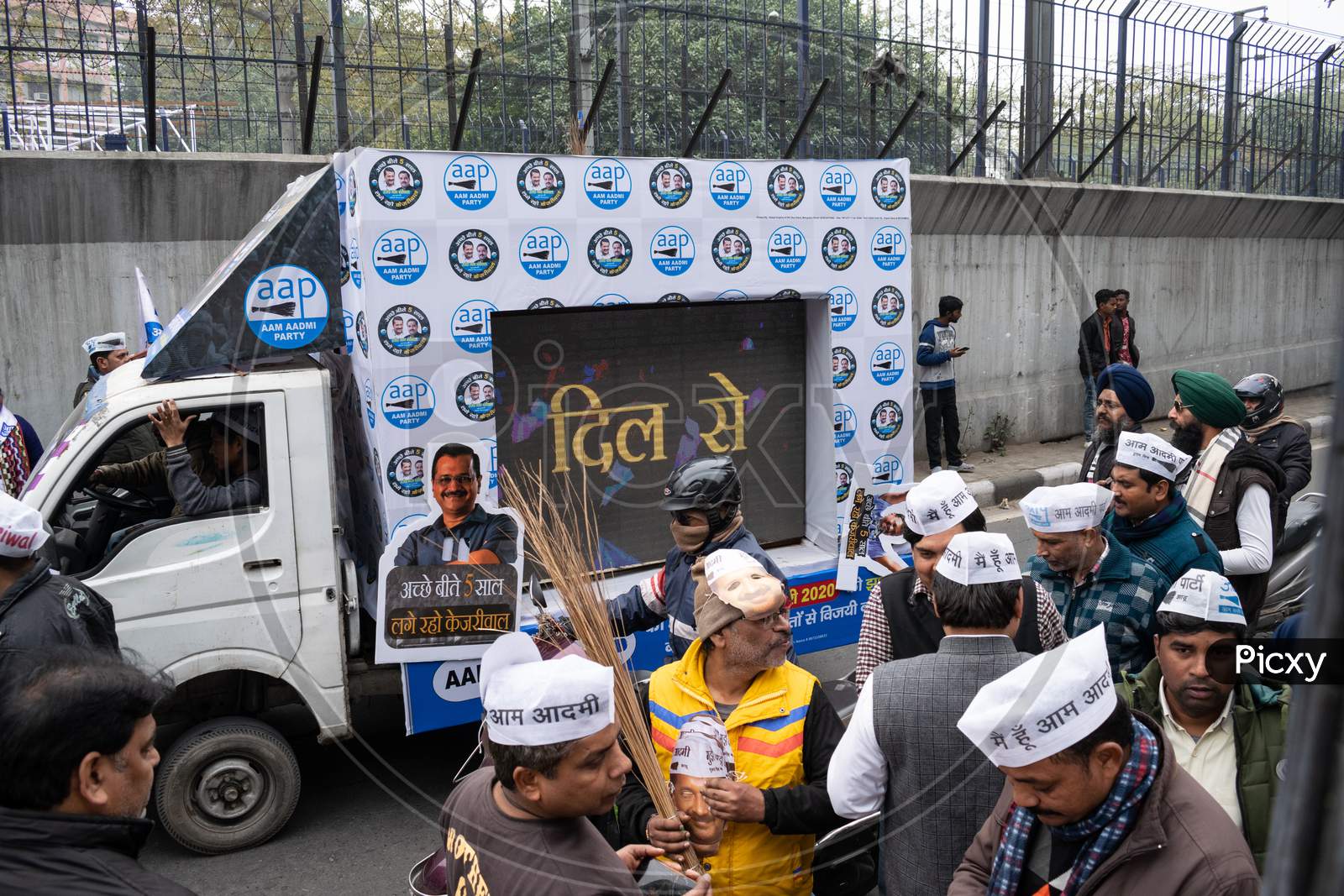 Delhi Assembly Election Campaign by Aam Aadmi Party AAP supporters
