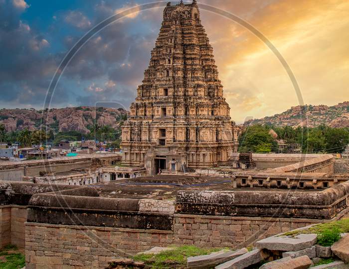 Virupaksha Temple in Hampi With Temple Shrine And  Golden  Sunset Clouds in Background