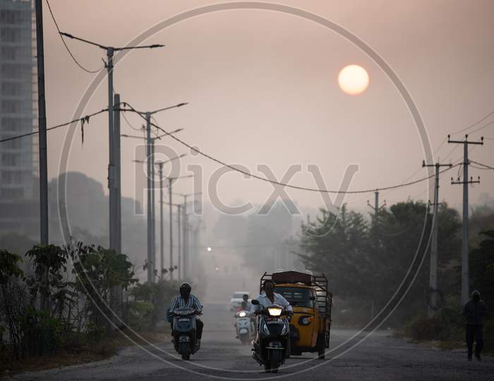 Commuting Vehicles On Kaithalapur Road In an Winter Morning