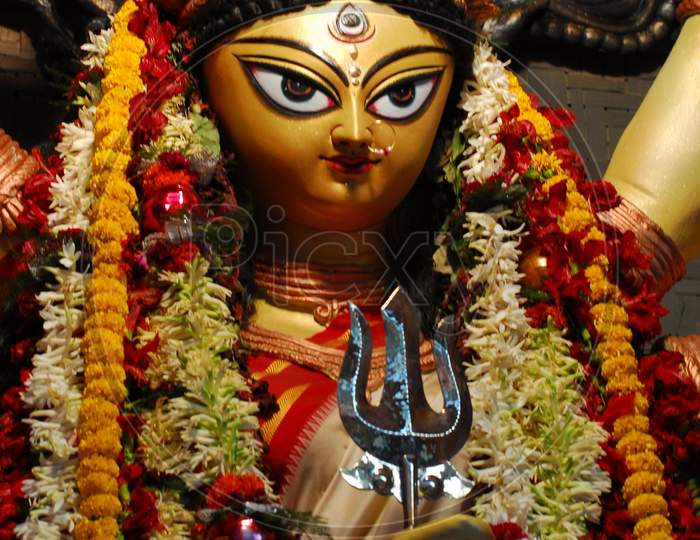 Indian Hindu Goddess Statue decorated with flowers