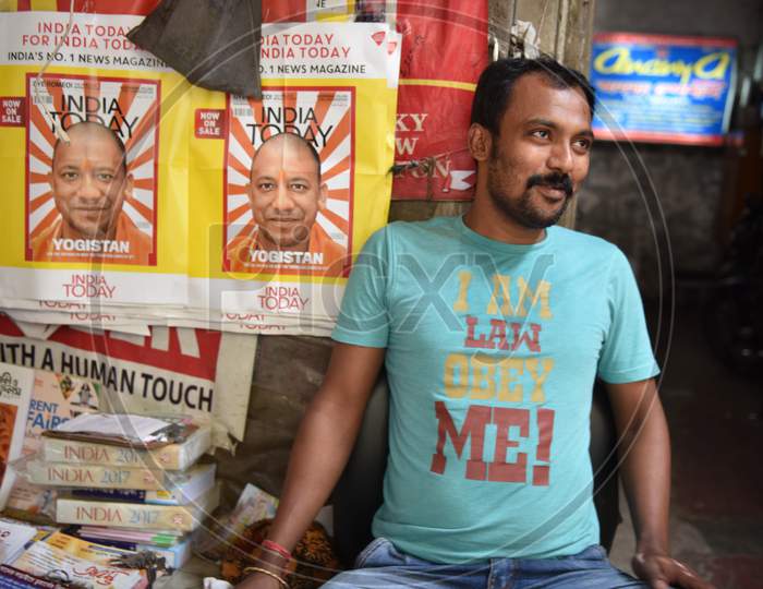 Indian Man wearing a saying T-shirt