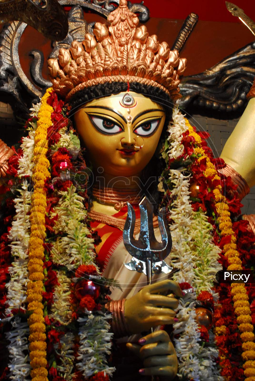 Indian Hindu Goddess Statue decorated with flowers