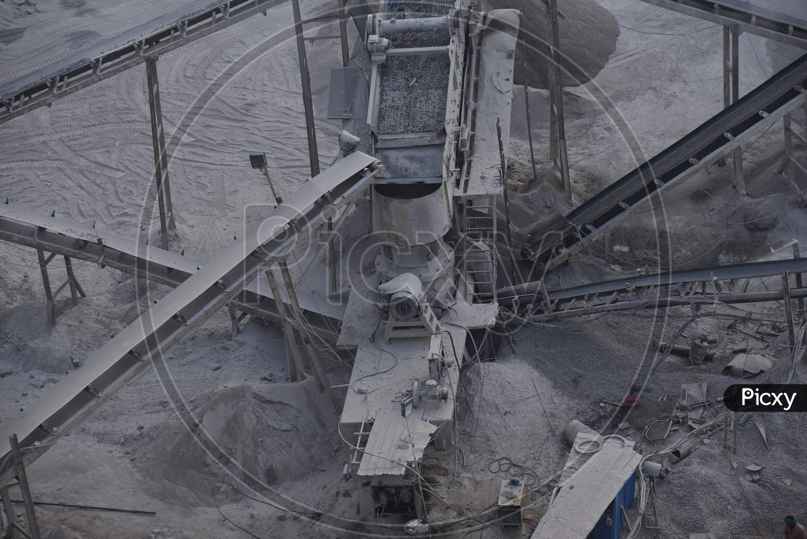Stone Crushing Industry With Heavy Attrition Machinery And Sieves