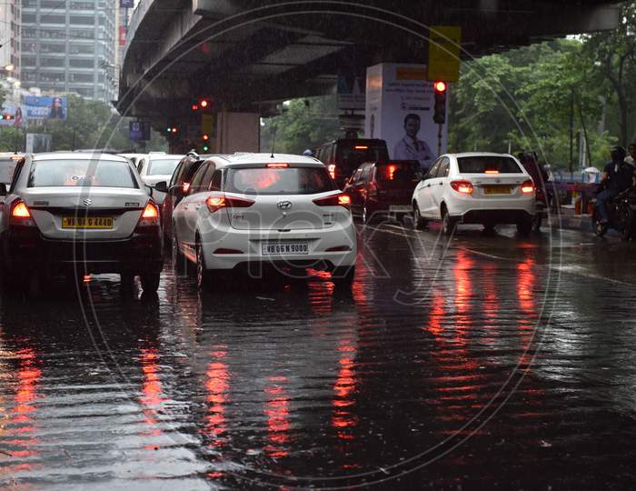 Commuters Drenching In Heavy Rains In Kolkata City