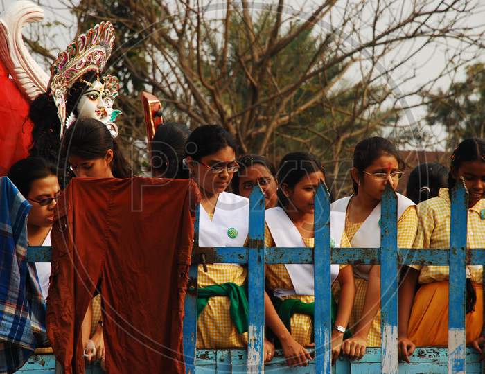 College students during Durga Visarjan