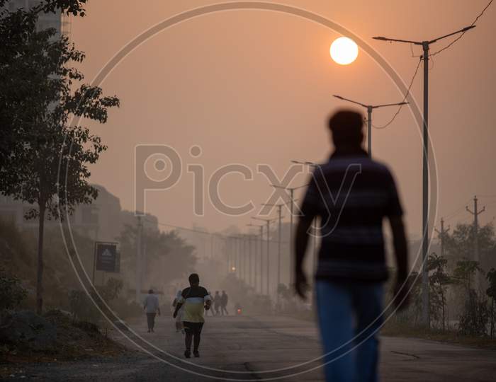 Morning Walkers  On Kaithalapur Road  In an Winter Morning