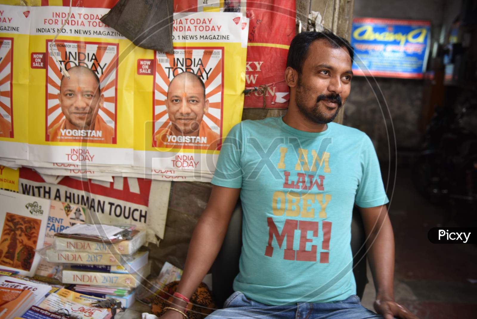 Indian Man wearing a saying T-shirt