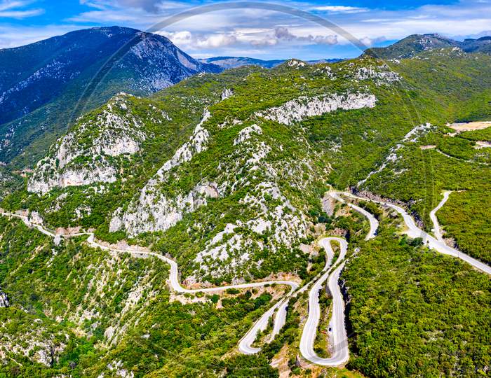 Winding Road In The Mountains Of Greece