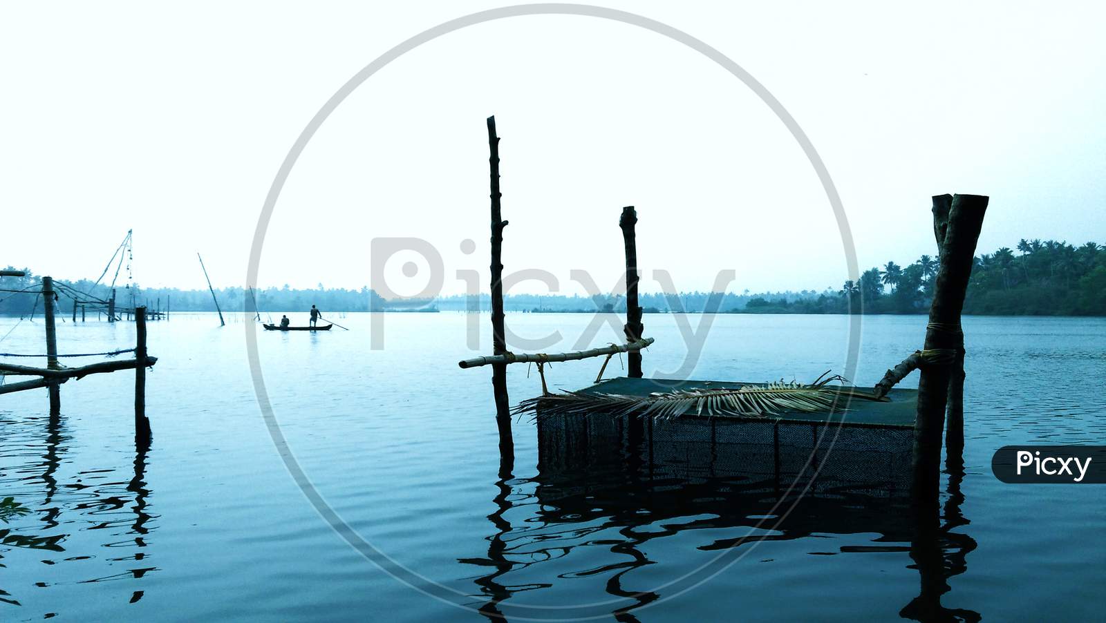 View of Fisherman in Lake