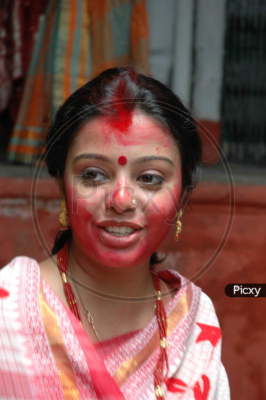 Indian Woman with sindhura during Durga Puja