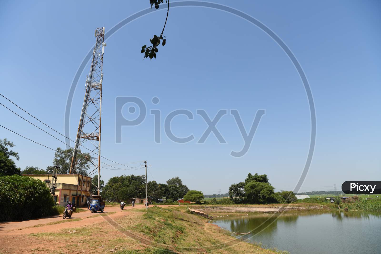 Electric Lines With Pole In an Rural Village
