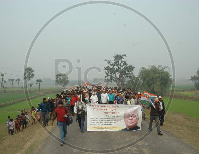 Former Indian President Pranab Mukherjee Walking As a Rally  At an Tribal Village  During  Tribal Festival Celebrations In Murshidabad