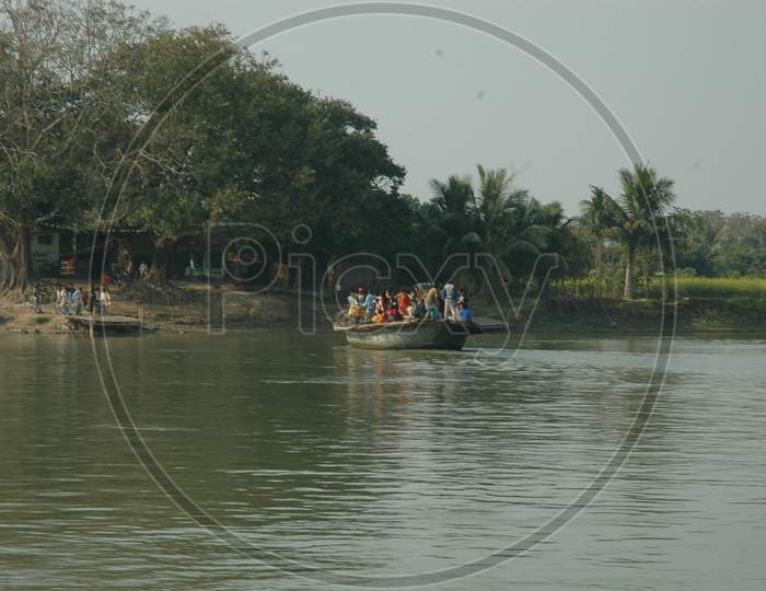 Indian People traveling on a Watercraft