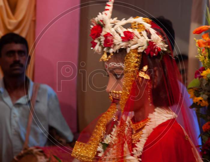 Indian Girl in a Durga Devi Costume during puja