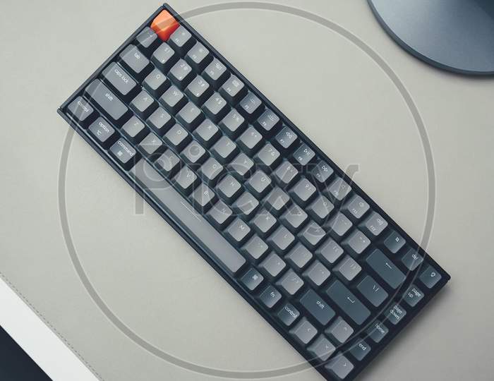 Wireless Keyboard  On a Desk Aerial View