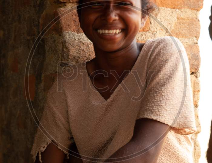 Portrait of Indian Rural Village Girl At a House