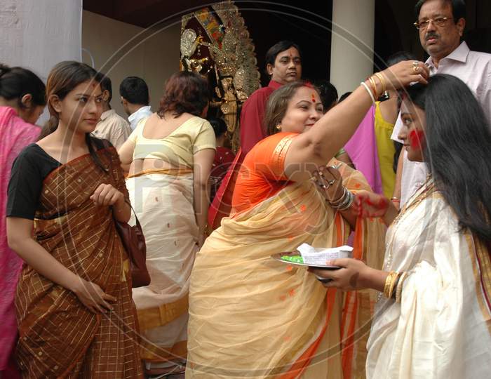 Indian Women devotees during Durga Puja