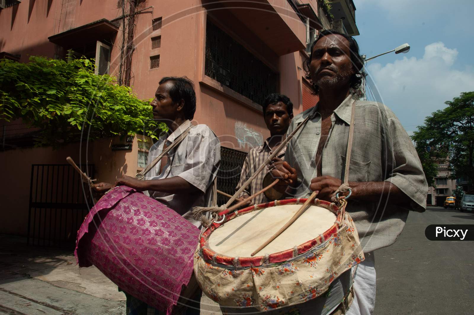 Indian Drummers playing Dholak during Durga Devi Visarjan