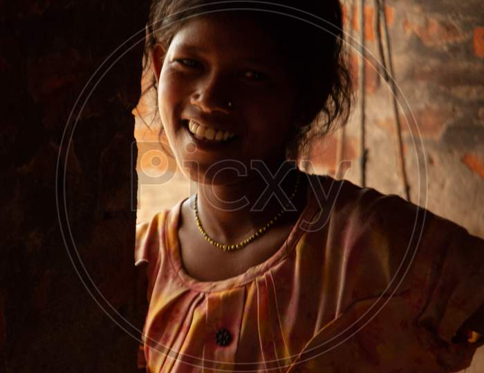 Portrait of Indian Rural Village Girl At a House